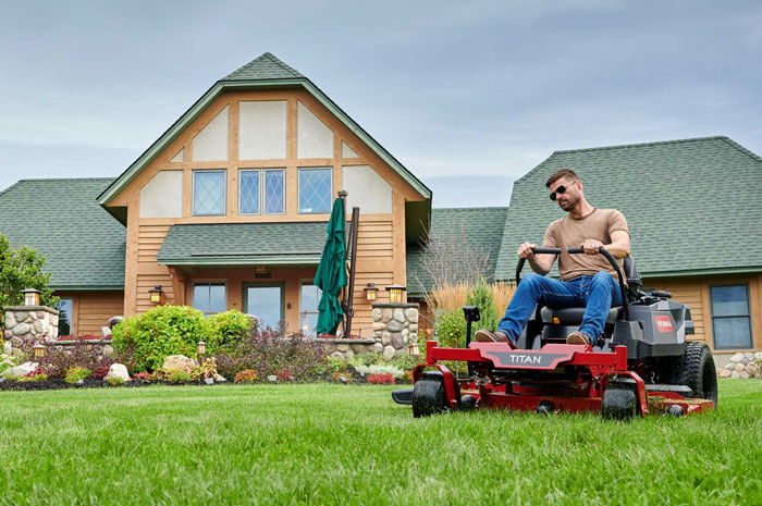 Man using Toro Titan in his front yard