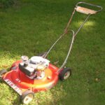 Toro lawnmower from 1968 in a green yard