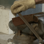 Man sharpening blade