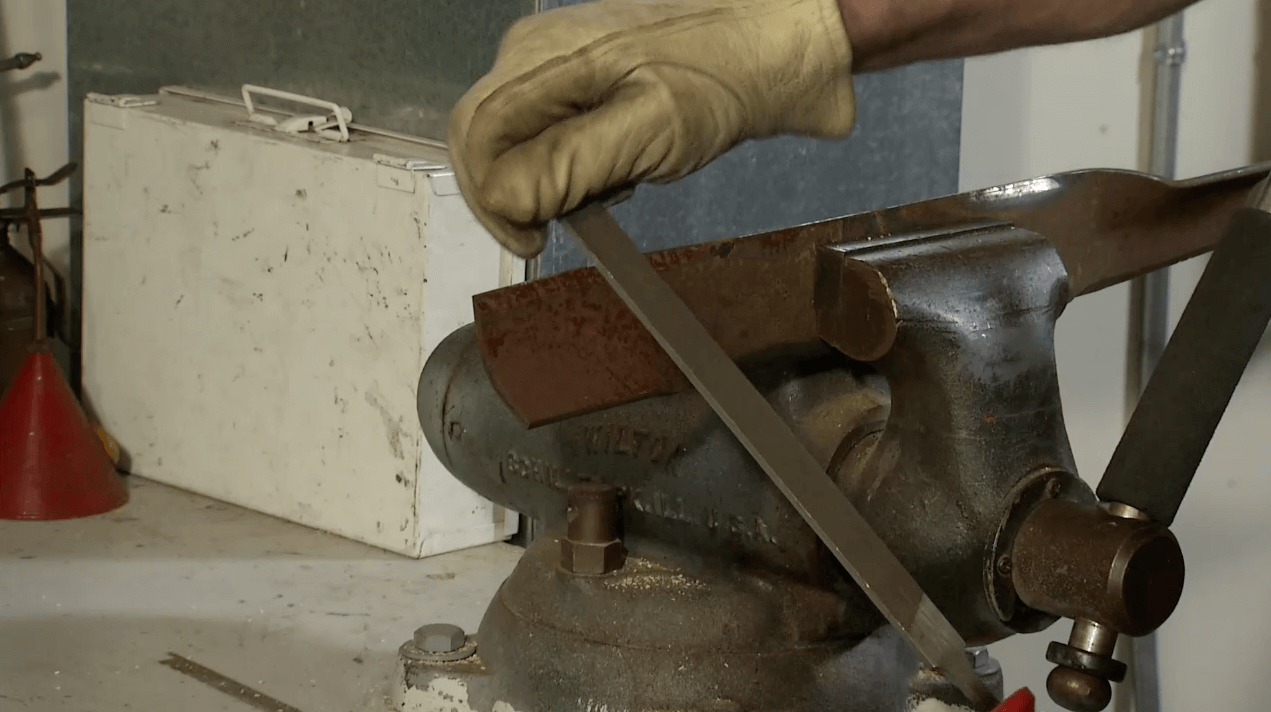 Man sharpening blade