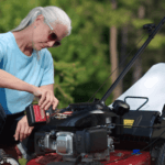Woman pouring oil into Toro lawnmower