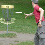 Man playing frisbee golf